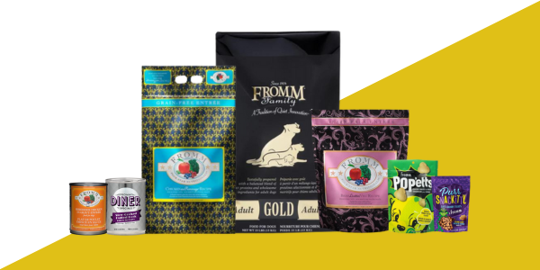 A variety of Fromm Family pet food products displayed against a yellow and white background. The selection includes bags of dry food, canned food, and treat pouches, featuring the Fromm Family logo and a range of product varieties such as grain-free, adult gold, and puppy snacks.